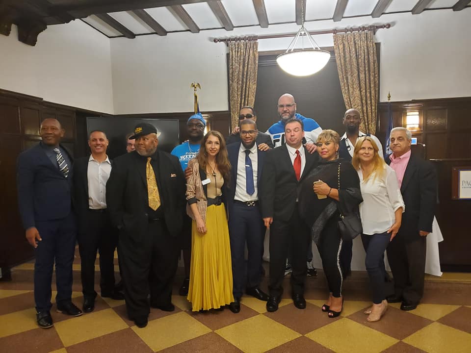 Dr. Marina Sorochinski with exonerees and advocates at a wrongful conviction event
