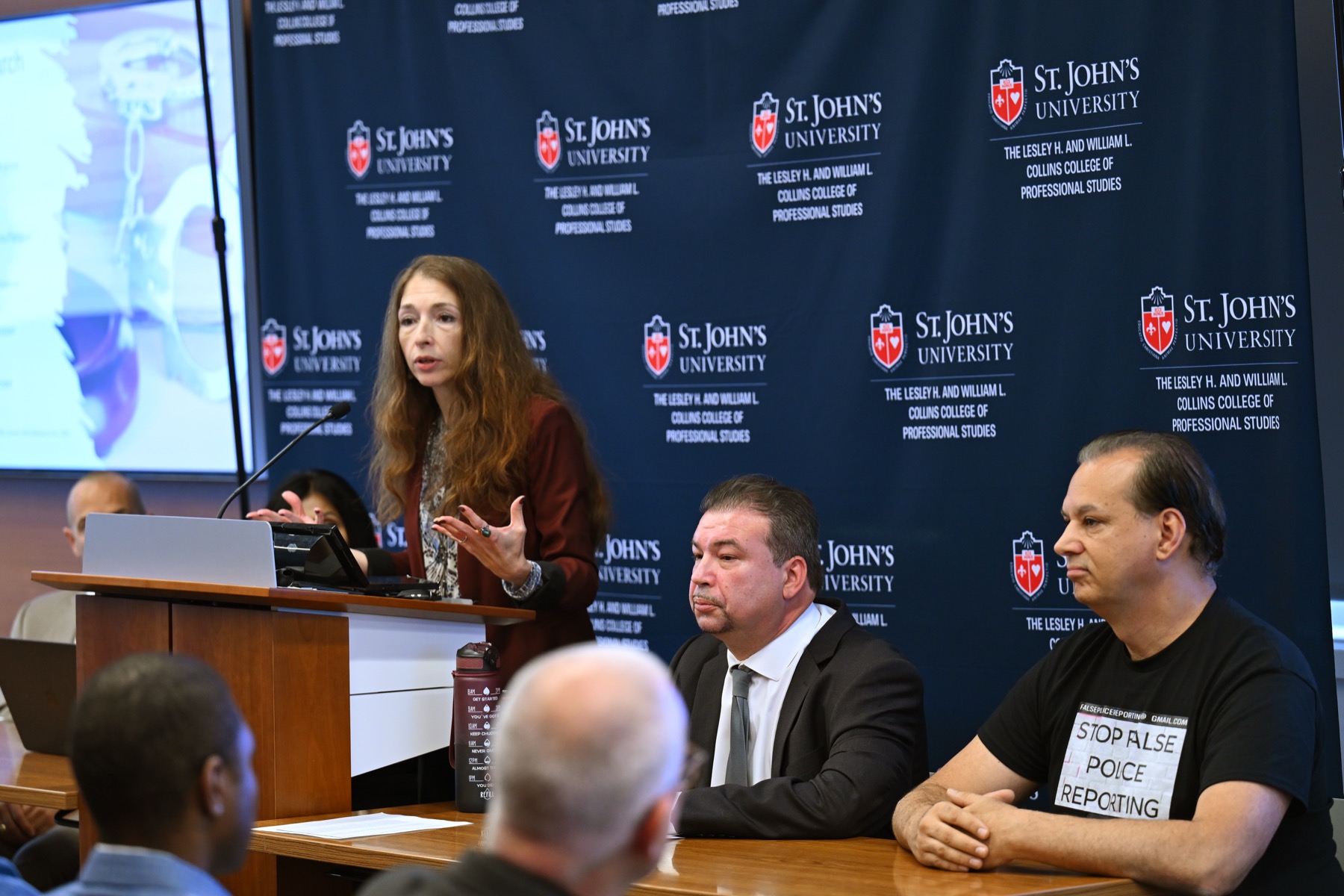 Dr. Marina Sorochinski speaking on a panel at St. John’s University
